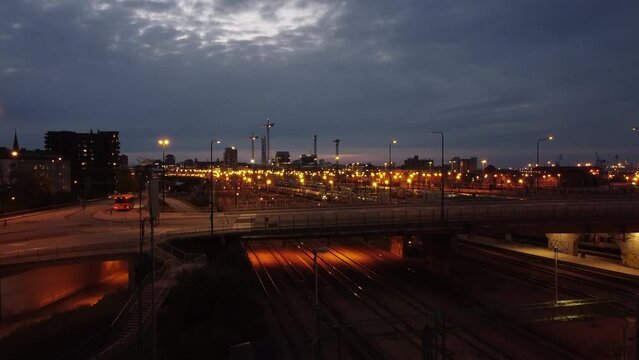 Drone At Night Rising Over Traffic On Bridge In Malmo