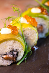 rice rolls with avocado and cheese japanese cuisine