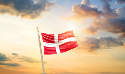 Denmark national flag cloth fabric waving on the sky - Image