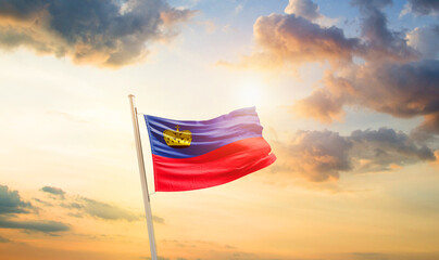 Liechtenstein national flag cloth fabric waving on the sky - Image - obrazy, fototapety, plakaty