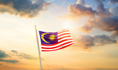 Malaysia national flag cloth fabric waving on the sky - Image