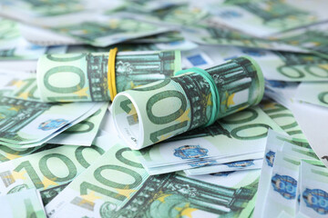 Obraz na płótnie Canvas 100 Euro banknotes as background, closeup. Money exchange
