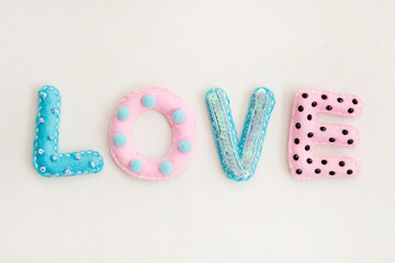 Stuffed felt letters with decorations. Word 