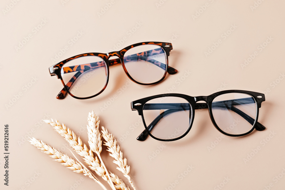 Canvas Prints stylish eyeglasses over pastel background. optical store, glasses selection, eye test, vision examin