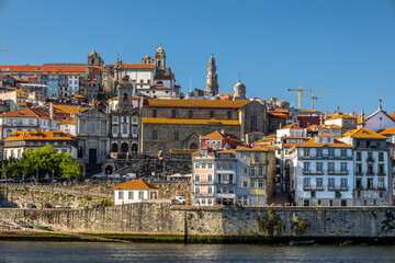 City of Oporto, Portugal in the margins of the Douro river. Douro river in the city of Oporto with...