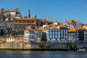 City of Oporto, Portugal in the margins of the Douro river. Douro river in the city of Oporto with...