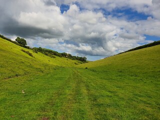 Dry valley landscape with sky and clouds