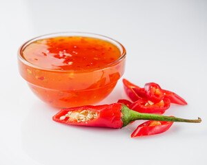 sweet chili sauce on a white acrylic background