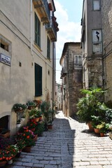 Obraz na płótnie Canvas A narrow street in Trivento, a mountain village in the Molise region of Italy.