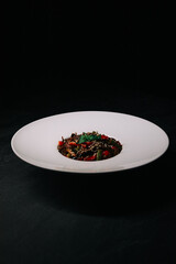 red pepper on black plate