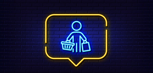 Neon light speech bubble. Buyer with shopping cart line icon. Customer with bags sign. Supermarket client symbol. Neon light background. Buyer glow line. Brick wall banner. Vector