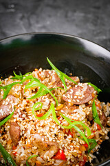 traditional chinese fried rice on black background