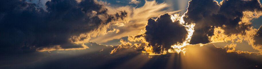 Landscape with the rays of God. Dramatic sky with sun rays shine through the clouds. The power of...