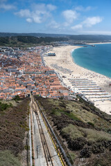 Nazare, beach resort in Portugal, during summer, aerial view of the bay
