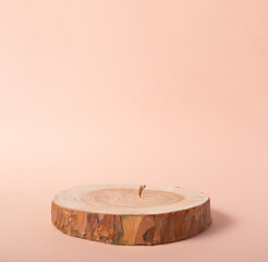 Wooden eco rustic pine tree wood circle disc platform podium on beige background. Minimal empty display product presentation scene. Two rings, two tiers of podiums.