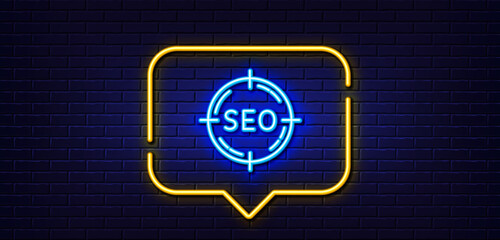 Neon light speech bubble. Seo target line icon. Search engine optimization sign. Aim symbol. Neon light background. Seo glow line. Brick wall banner. Vector