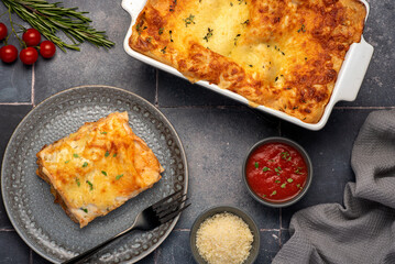 Food photography of lasagna, cheese, parmesan, oregano, tomato sauce