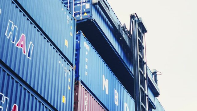 Container stacker working at container yard.