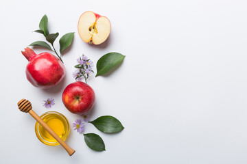 Flat lay composition with symbols jewish Rosh Hashanah holiday attributes on colored background, Rosh hashanah concept. New Year holiday Traditional. Top view with copy space