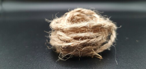 Brown jute isolated closeup. Natural brown rope. Rope isolated closeup.
