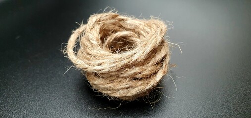 Brown jute isolated closeup. Natural brown rope. Rope isolated closeup.