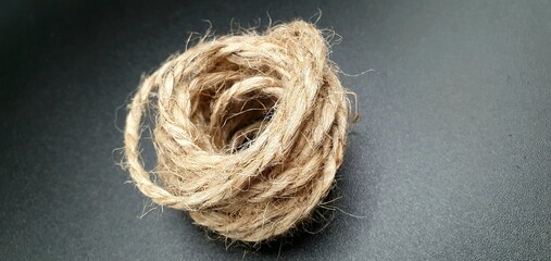 Brown jute isolated closeup. Natural brown rope. Rope isolated closeup.