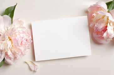 Invitation card mockup with pink peony flowers