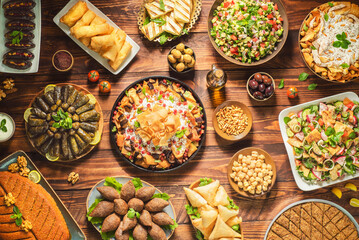 Arabic Cuisine;Middle Eastern traditional dishes and assorted meze. Vine leaves, kibbeh, chicken fatteh, spring rolls, sambusak, kibbeh nayyeh, makdous, haloumi, olives, eggplant fatteh and salads.