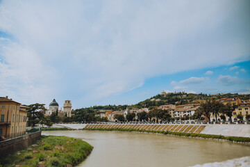 Fototapeta premium Streets of Verona Italy, empty city. Buildings and views. The beauty of the city bridges and rivers.