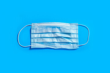 Protection against respiratory infection. Danger of viral infection. Isolate on a blue background....