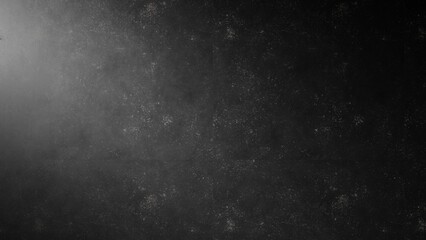 3D rendering. Dust texture on black background. Smoke or fog on a dark background. Black wall with side lighting. Black marble wall with white dots.