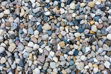 Mix colors of pebbles stone, element for outdoor landscaping and garden decorative. Top view, abstract small rocks pattern. Texture of nature background.