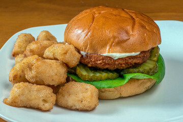 chichen sandwiich   and served with broccoli tots