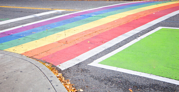 The crosswalk in downtown Seattle Washington painted with a rainbow