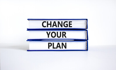 Change your plan symbol. Concept words Change your plan on books on a beautiful white table white background. Business, finacial and change your plan concept. Copy space.