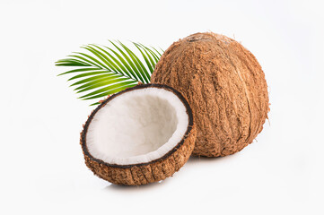 Coconuts with leaves on white background