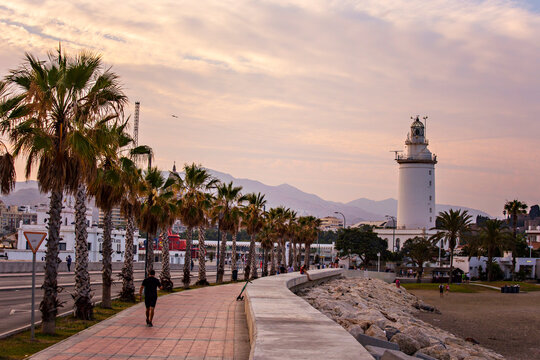 La Farola - Malaga lighthouse at sunset, Andalusia, Spain