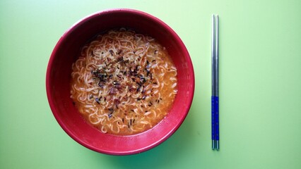 Indonesian special curry instant noodles with fried onions and nori