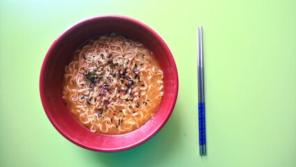 Indonesian special curry instant noodles with fried onions and nori