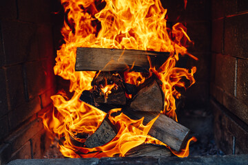 burning fire logs in fireplace