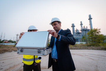 Businessman and engineer meeting and discuss project in working site, Teamwork project concept.