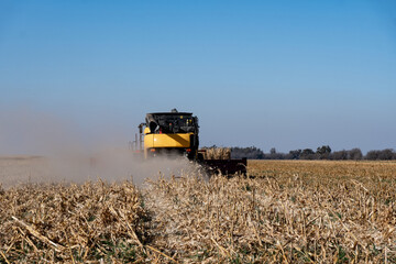 Combine harvester working on a field