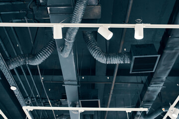 Ceiling mounted air condition units with other parts of ventilation system. Aluminum tubes, cables...