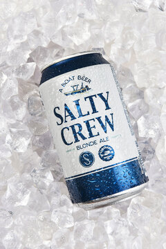 IRVINE, CALIFORNIA - 25 JUL 2022: A can of Salty Crew Blonde Ale in a bed of ice.