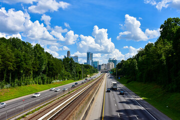 North and southbound lanes of the Georgia 400 highway plus tracks for the MARTA Mass Transit trains
