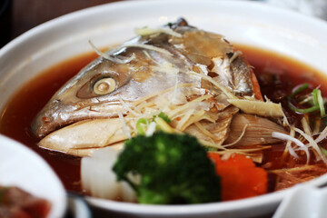 Japanese food set, steamed salmon head with soy sauce