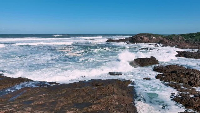 Turbulent seas and rocky coast at Blanch Reserve, Anna Bay, NSW, Australia.