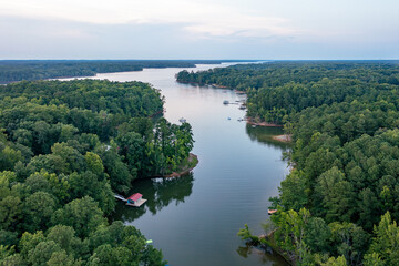 Aerial view of a cove on Kerr Lake in North Carolina at dusk - obrazy, fototapety, plakaty