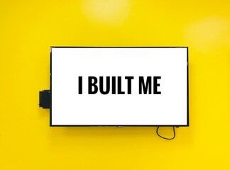 I built me - text in Television on yellow background