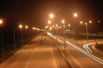Fototapeta na wymiar time lapse traffic in night